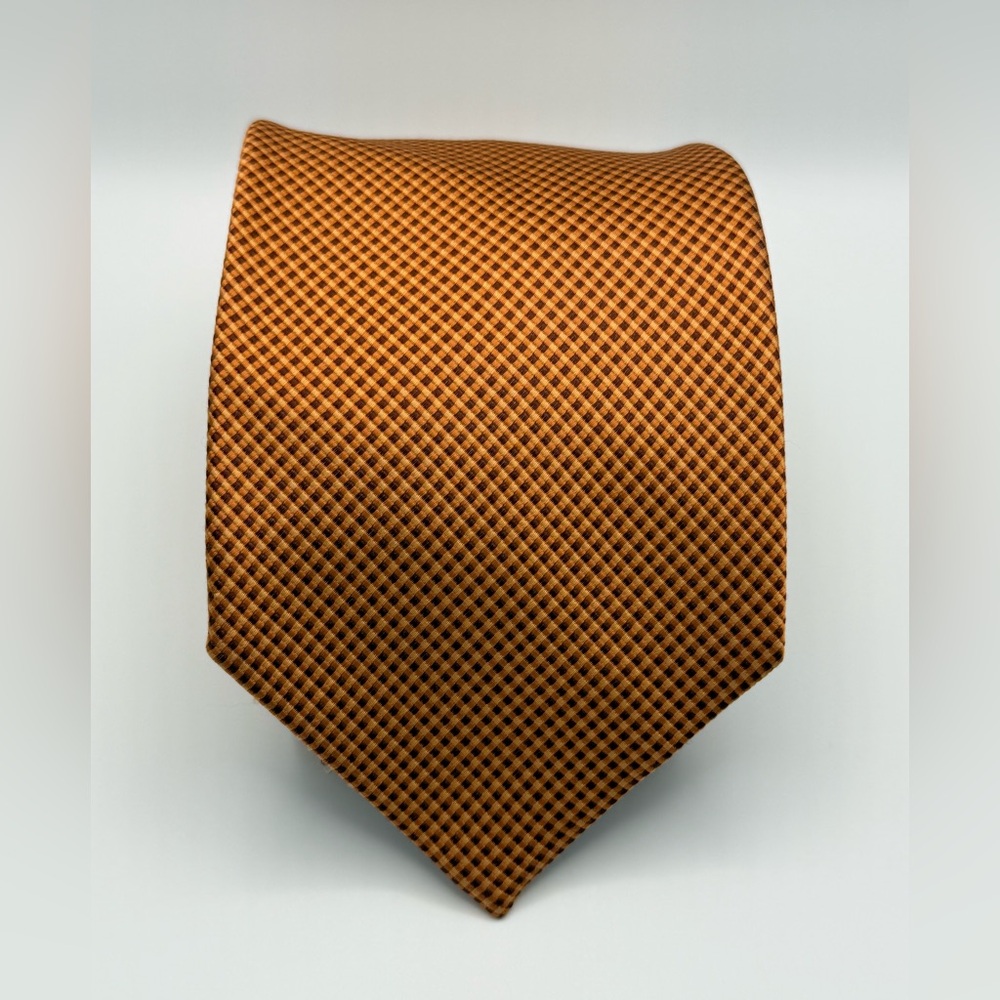 Monti silk tie. Featuring a sharp gold and black micro-check pattern.